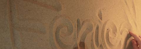 Teaser Legasthenie geschriebener Schriftzug -Ferien- im Sand